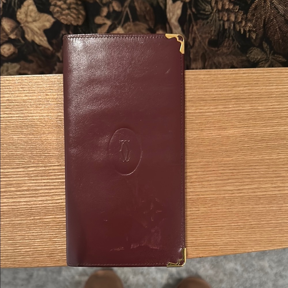 Cartier Burgundy Leather Wallet with Gold Accents